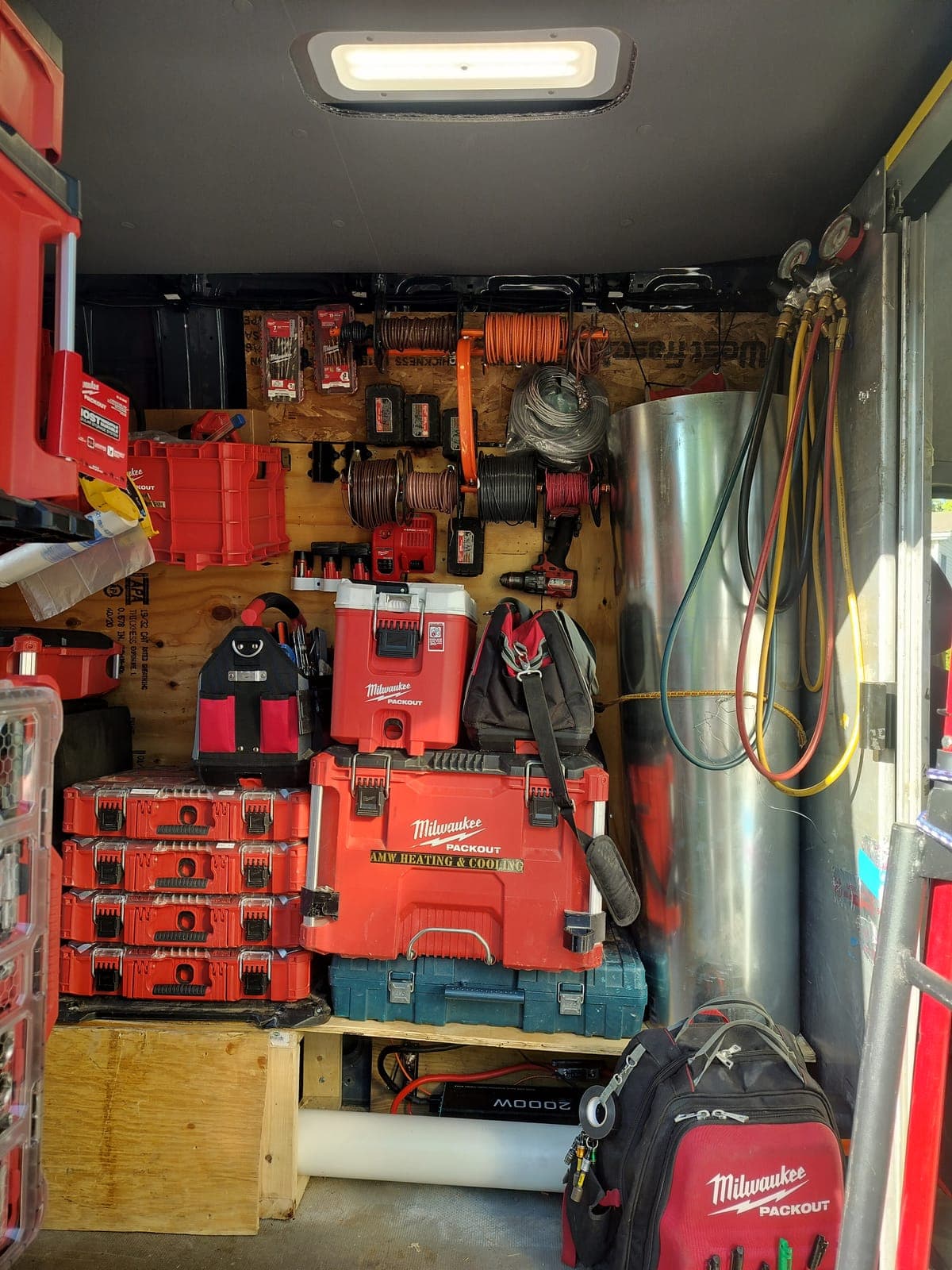 Inside an organized AMW service van, stocked so most repairs finish in one visit