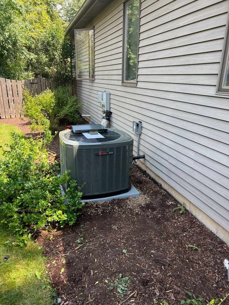 New air conditioning condenser installed by American Mechanical Works in the Chicago North Shore