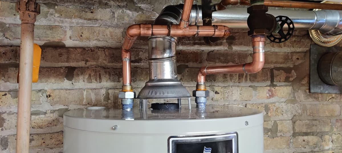 Water heater and gas piping installed by American Mechanical Works