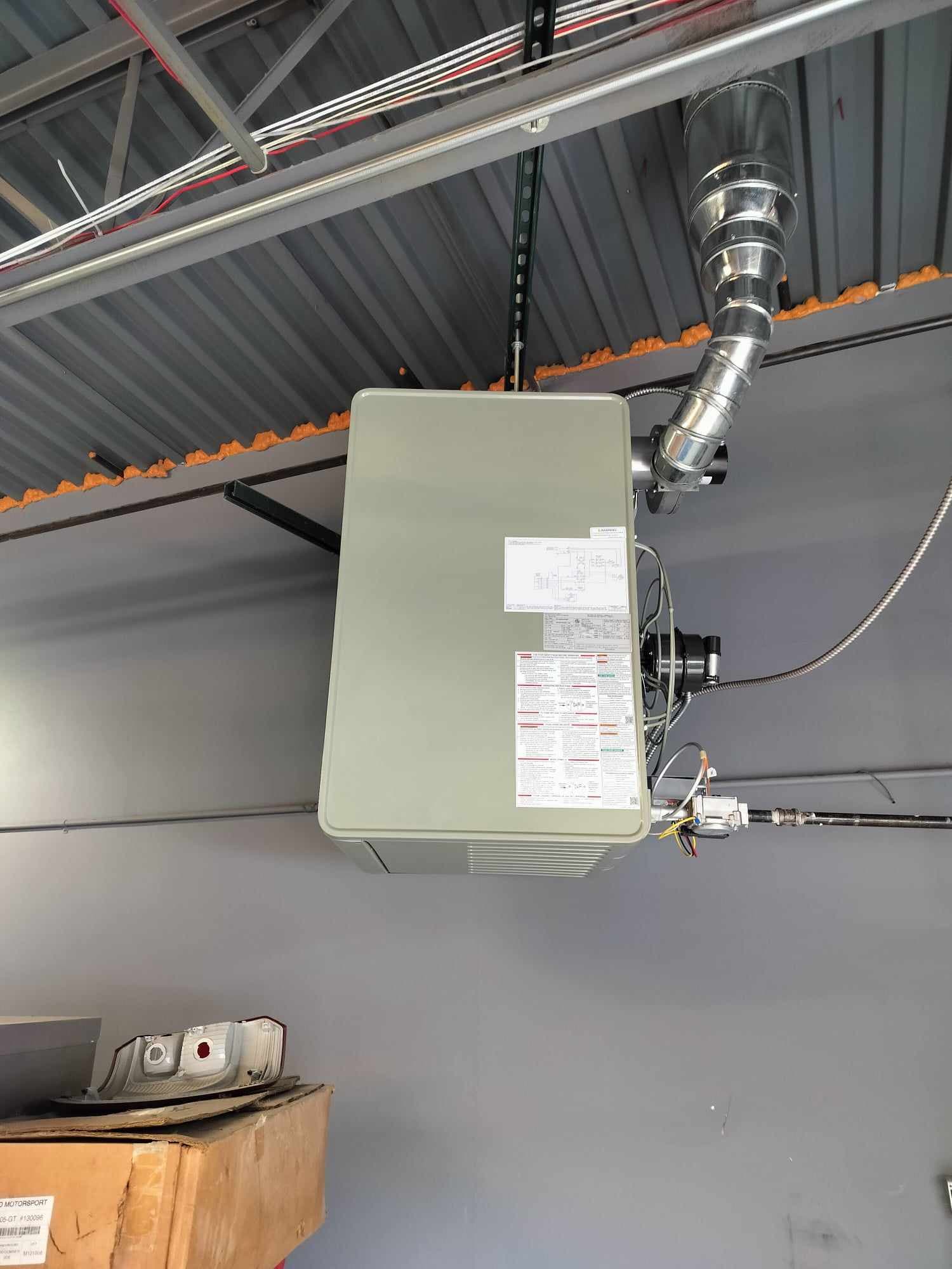 Gas-fired unit heater installed in a warehouse by American Mechanical Works