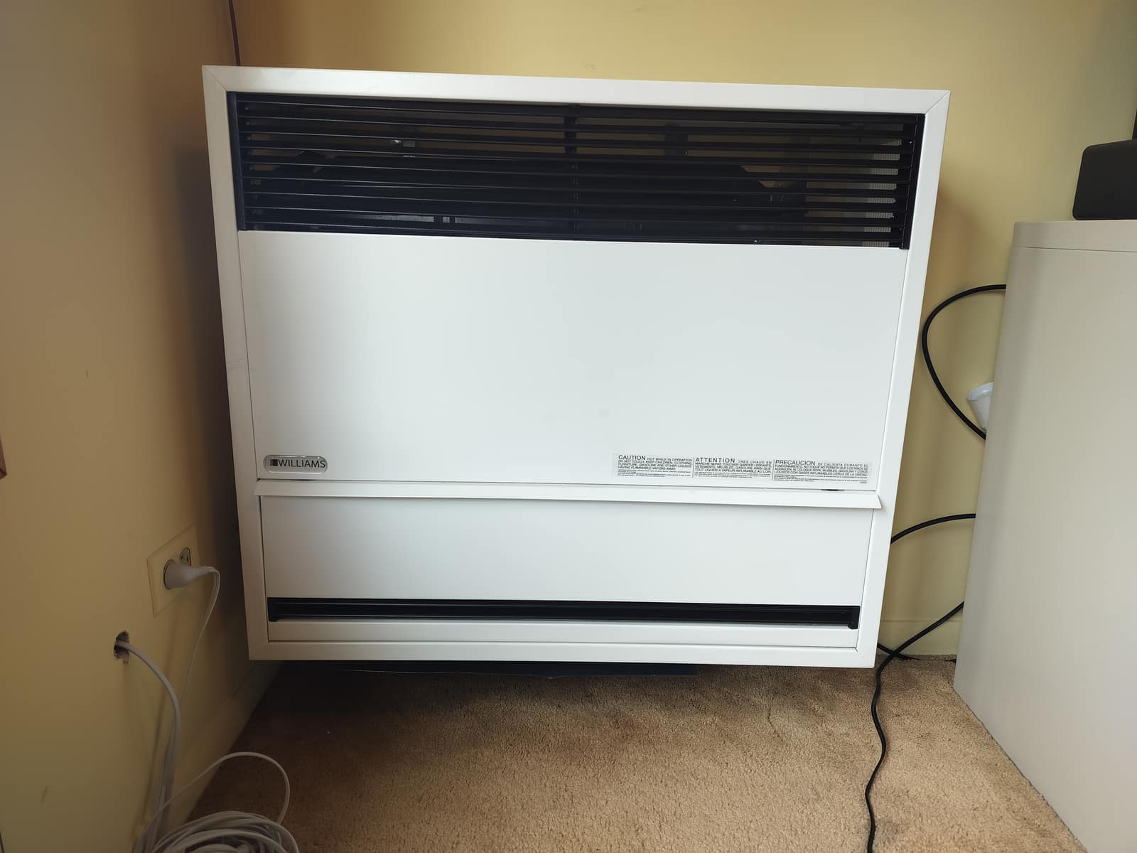 Gas-fired unit heater installed in a warehouse by American Mechanical Works